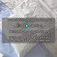 White MTAN shipping envelope with text overlay on a textured surface